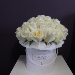 25 or 50 white roses in a white medium signature box