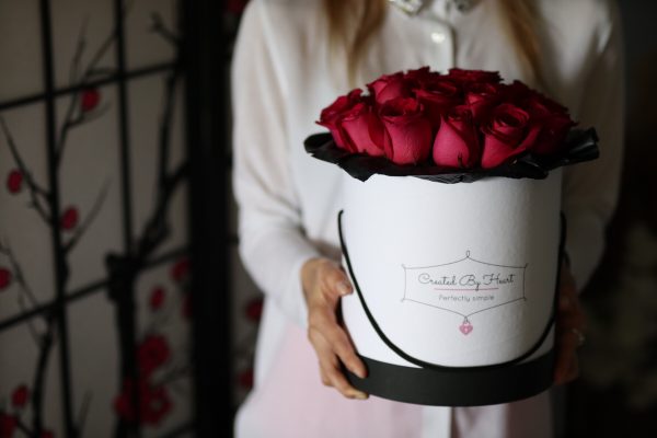 25 red roses in a medium size signaturewhite box