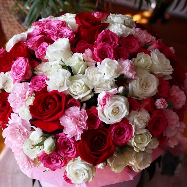 Mixed colors spray roses in a medium or large signature box